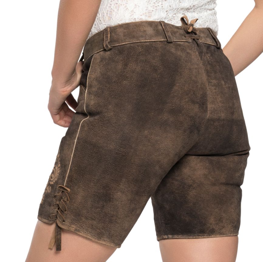 Back view of brown traditional women's lederhosen shorts with a rustic suede finish and a back tie detail at the waistband.