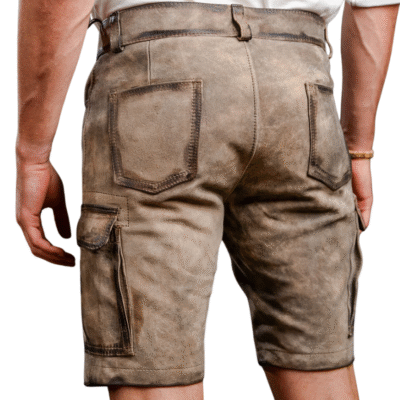 Back view of rustic brown knee-length leather cargo shorts featuring dual patch pockets, side cargo pocket with flap, and wide belt loops.