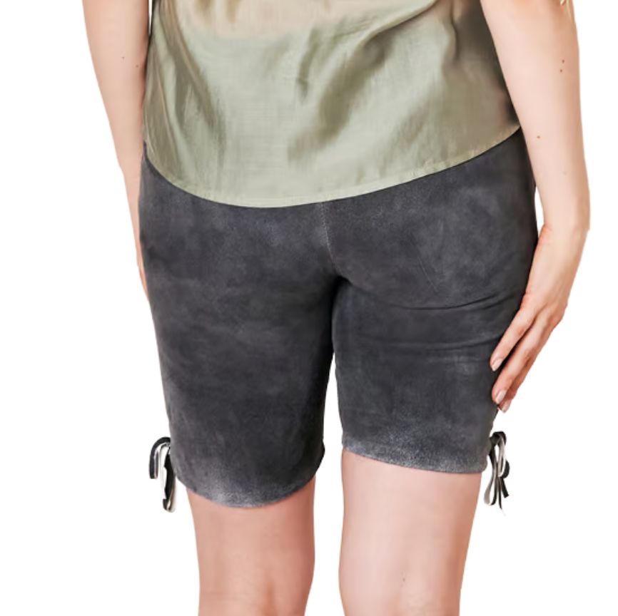 A woman wearing dark grey suede Bavarian lederhosen shorts, viewed from the back, with a plain design and drawstring at the waist.