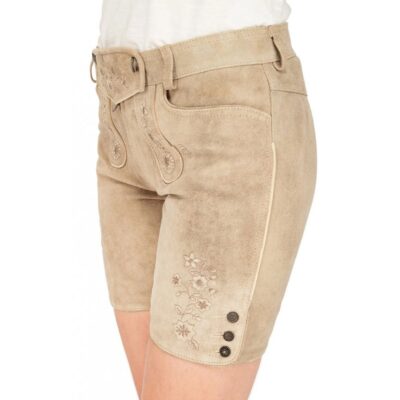 Side angle of beige suede women's lederhosen featuring floral embroidery and decorative buttons along the outer thigh.
