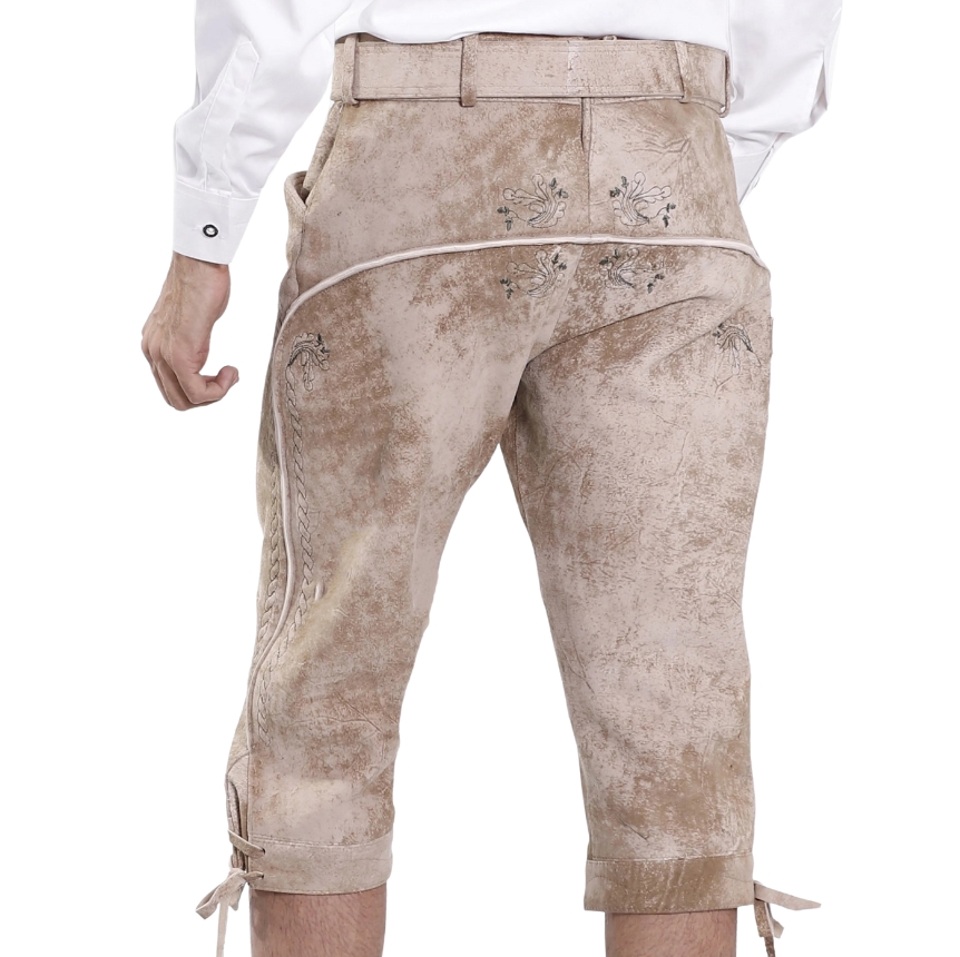 Knee-length beige Bavarian leather bundhosen shown from the rear, featuring decorative embroidery across the seat and sides, belt loops, and lace-tie hems.