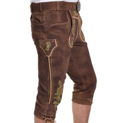 Right side view featuring bright green embroidered pocket and floral leg design.