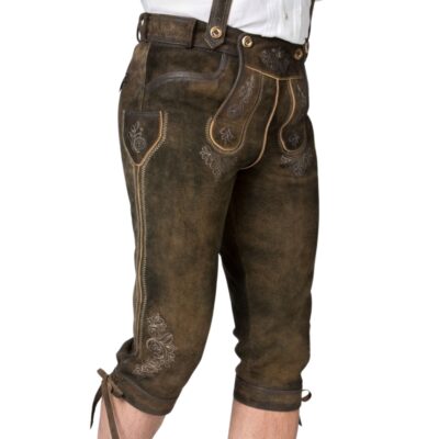 Right angled view of chestnut bundhosen highlighting the embroidered side pocket flap, dual vertical stitching, and rustic suede texture.