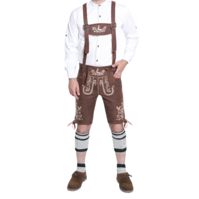 Full view of a man wearing a complete Bavarian lederhosen outfit, including a white shirt, brown embroidered shorts with suspenders, calf socks, and brown shoes.
