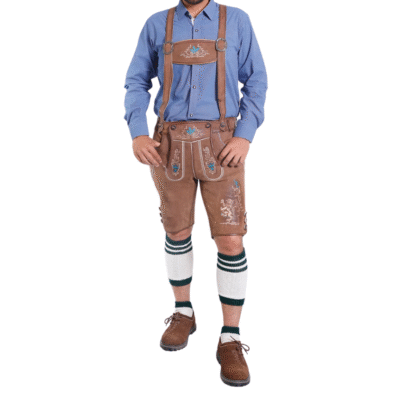 Man wearing brown embroidered lederhosen and a blue shirt with suspenders, styled for Oktoberfest or traditional German attire.