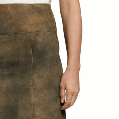 Zoomed-in seam and suede grain on high waistband.