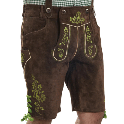 Close-up side view of traditional brown suede lederhosen featuring bright green embroidery with oak leaf and acorn motifs, and side lace detail.