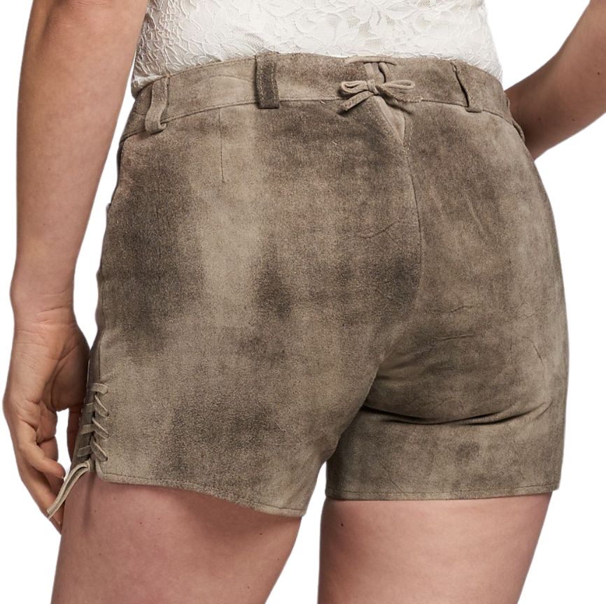 Back view of women’s rustic taupe suede lederhosen shorts with a distressed finish, small tied waistband, and side lace-up detailing near the hem.
