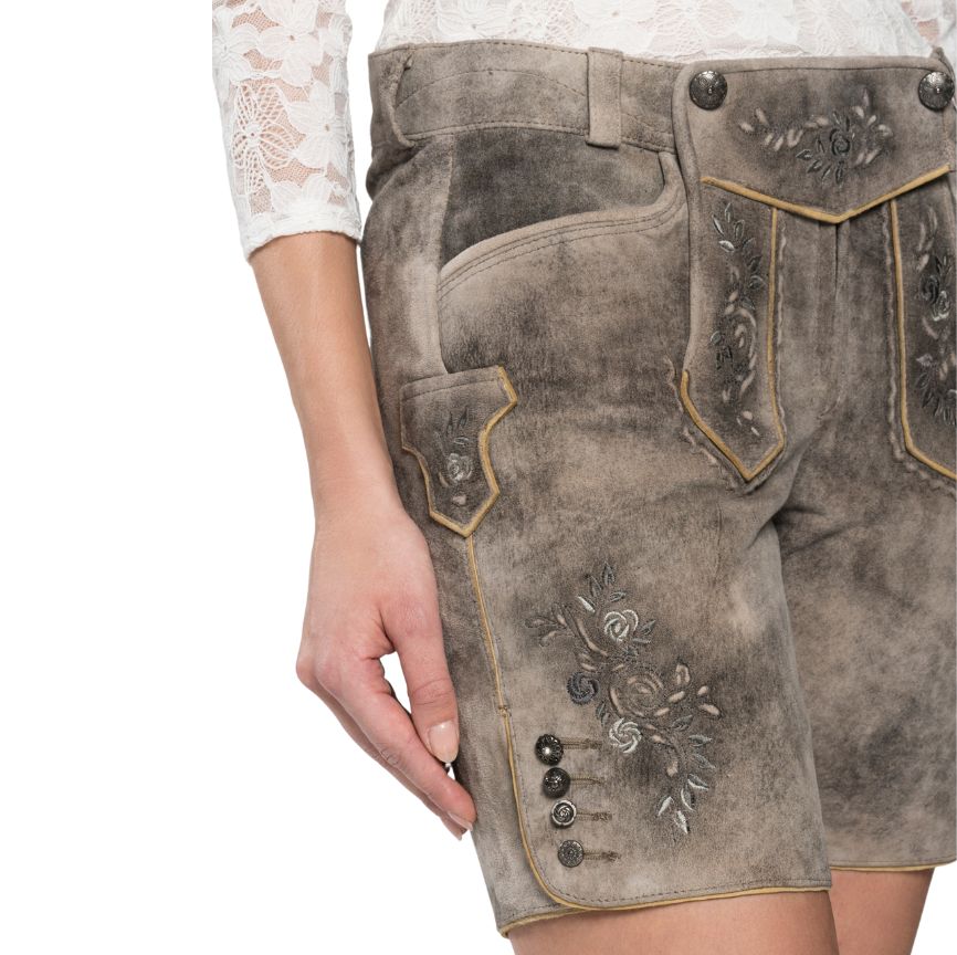 Side view of grey women's Lederhosen shorts with embroidery – Close-up of the side embroidery and button detailing on the leg of grey suede Lederhosen.