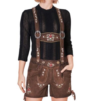Woman wearing brown Bavarian leather shorts with red rose embroidery and suspenders, styled with a black lace top.