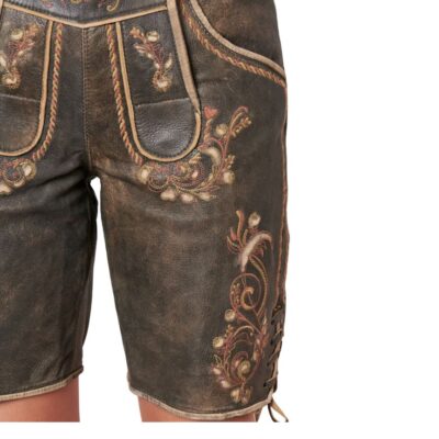 Close-up of traditional Bavarian embroidery on the side of brown Lederhosen shorts, featuring multicolored floral and scroll motifs.